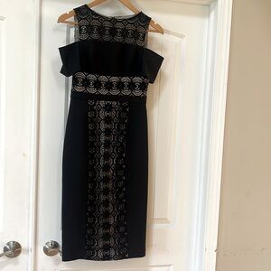 EUC. Worn once and dry cleaned. Maggy London midi black dress.